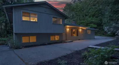 This home is so magical all lit up at night!