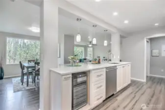 Kitchen open to dining room, and easy access to outdoor spaces.