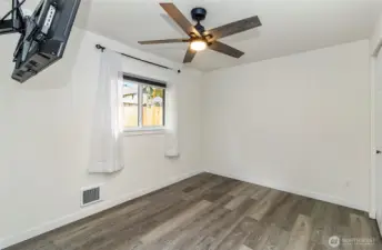 Primary bedroom with a great window for lighting