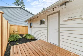 The view of the back door straight from the kitchen/dining area. Perfect place for the BBQ
