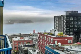 Views of Elliott Bay and Olympics from balcony