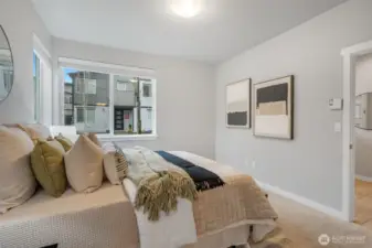 Lower level bedroom with its own bathroom.