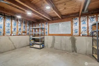 Unfinished basement spanning 345 SQFT.