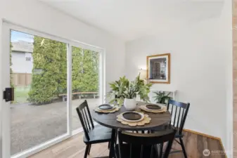Gracious dining off kitchen and adjacent  to HUGE patio