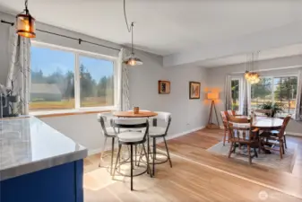 Looking into the dining space from kitchen entry.