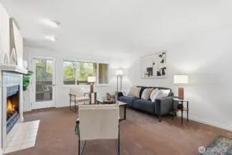 Large Living Room with Balcony & Cozy Fireplace
