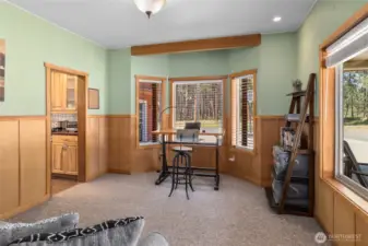 Sun-filled office that easily converts into a cozy additional sleeping area.