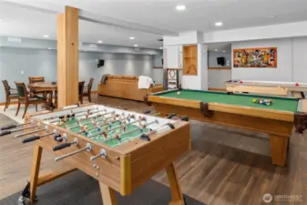 A fun-filled basement with room for a huge sectional, game table, pool table, foosball, and air hockey—ideal for family gatherings and game nights.