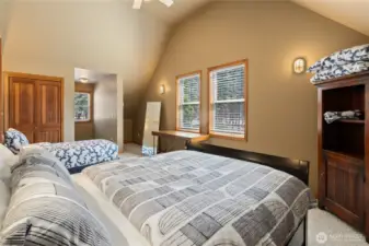 One of two spacious guest bedrooms upstairs, perfect for family or friends.