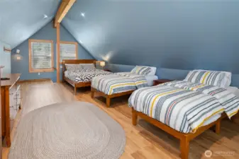 A bright, versatile space above the garage—perfect for guests, hobbies, or extra sleeping space.