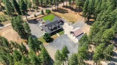 Enjoy 10 acres of level, usable land with a beautiful 4,400+ sq. ft. custom home and a detached shop ready for ADU possibilities.