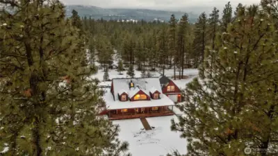 Tucked among the trees, this welcoming home blends peaceful surroundings with easy convenience.