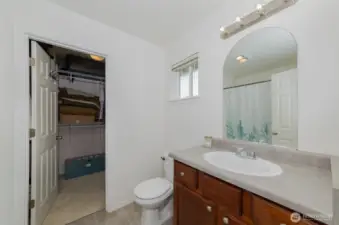 Primary bath to walk through closet