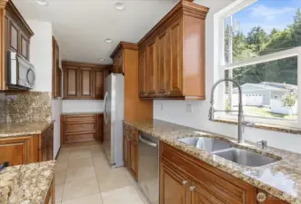 Custom maple cabinets and granite countertops.