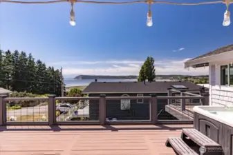 Relax in the hot tub and enjoy the views of Useless Bay with the Olympic Mountains looming in the distance.