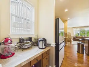 butlers pantry with walk in pantry
