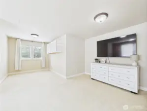 upstairs entertainment room wired for projector and surround sound