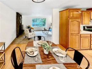 View of living room from dining area, very open and ideal for entertaining.