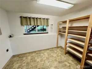 Huge laundry room with storage.