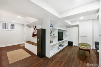 Well-designed built-in shelving and bench/coat rack in lower level. Note: Lower level entry from attached garage with convenient "drop zone" for coats and bags!