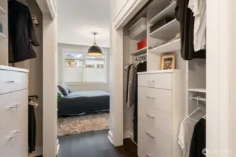 Walk-in/through closet to primary bath.