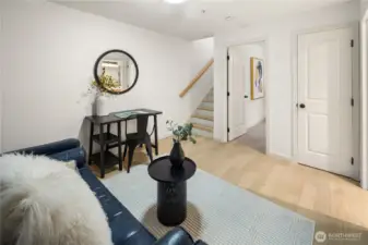 All right, let's head back up the stairs out the front door and then into the main building to check out the amenities. Again front entrance to the main building is just two doors west. Additionally, you can also access the main building lobby from the garage located right near your parking space