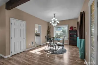 Dining room with shoe closet off entry and entrance to kitchen