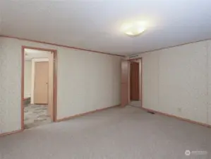 Primary bedroom, private bathroom shown