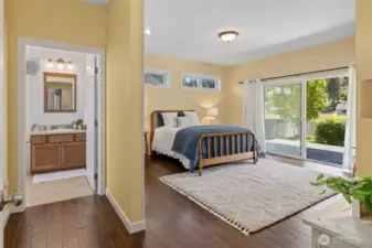 Spacious master bedroom features a walk-in closet and private bath access.