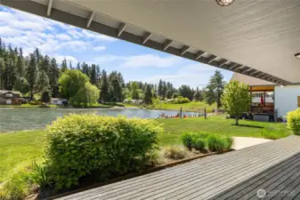 Unwind on the back porch while soaking in 75 feet of beautiful waterfront scenery.