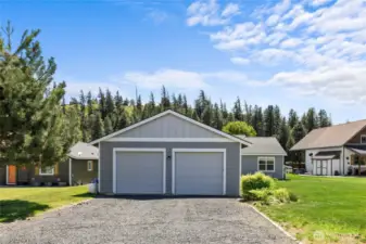Attractive garage exterior complements the home’s style with matching siding and functional design.