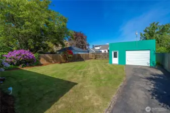 1 car detached garage with separate side shop.
