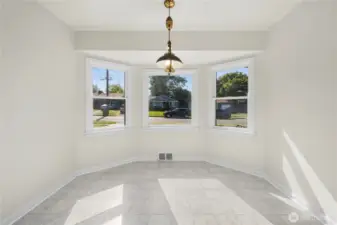 Large coved dining room off kitchen. Entire floor freshly painted.