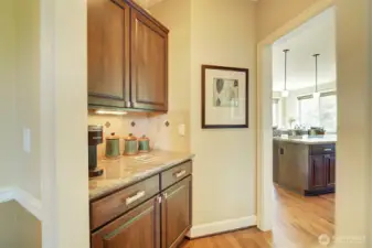 Butler pantry provides path to the dining room