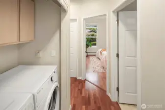 A large hallway closet houses your full sized washer/dryer. So convenient!