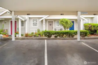 TWO carport spaces just outside the walkway to your home.