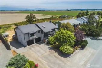 Front of the home with lots of off-street parking. Plenty of room for an RV or boat. Greenhouse in the back!