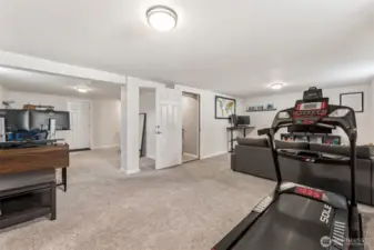 Large rec room on the lower level. TALL CEILINGS too! 87". (7' 3")