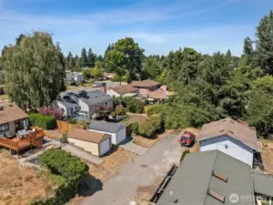 1 car detached garage. (Gray Garage On The Left) Wide alley access too.