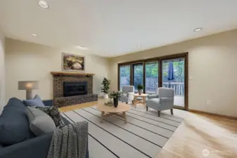 What a wonderful, spacious room for entertaining that can flow out to the deck and backyard in the summertime.