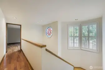 The upper level hallway leads into the Primary Suite on one end of the home and the 3 bedrooms and full bath at the other end for excellent separation of space.