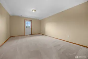 Large bonus room with private/covered porch!