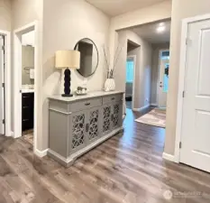 Hallway to Primary and Bedroom 1