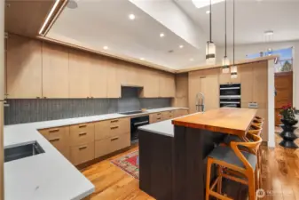 Quartz couonters, all Meile appliances, counter seating for 4...