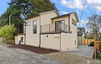 This detached, 2 bed, 1.75 bath home has two second story deck that face the Olympics and the water.