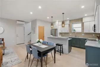 Enter into the main floor and be greeted by the bright kitchen.