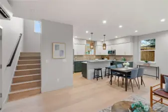 Engineered hardwoods throughout, and mini-splits in the home provide heat and AC.