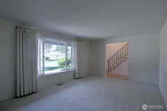 Located to the right after entering the home is this bright living room