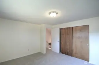 Upstairs bedroom located to the left of the stairway
