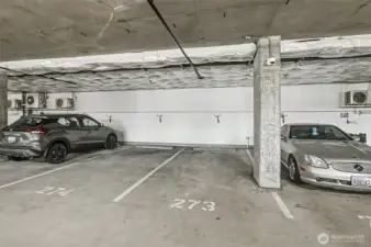 Two secure parking spaces included in the building’s covered garage.